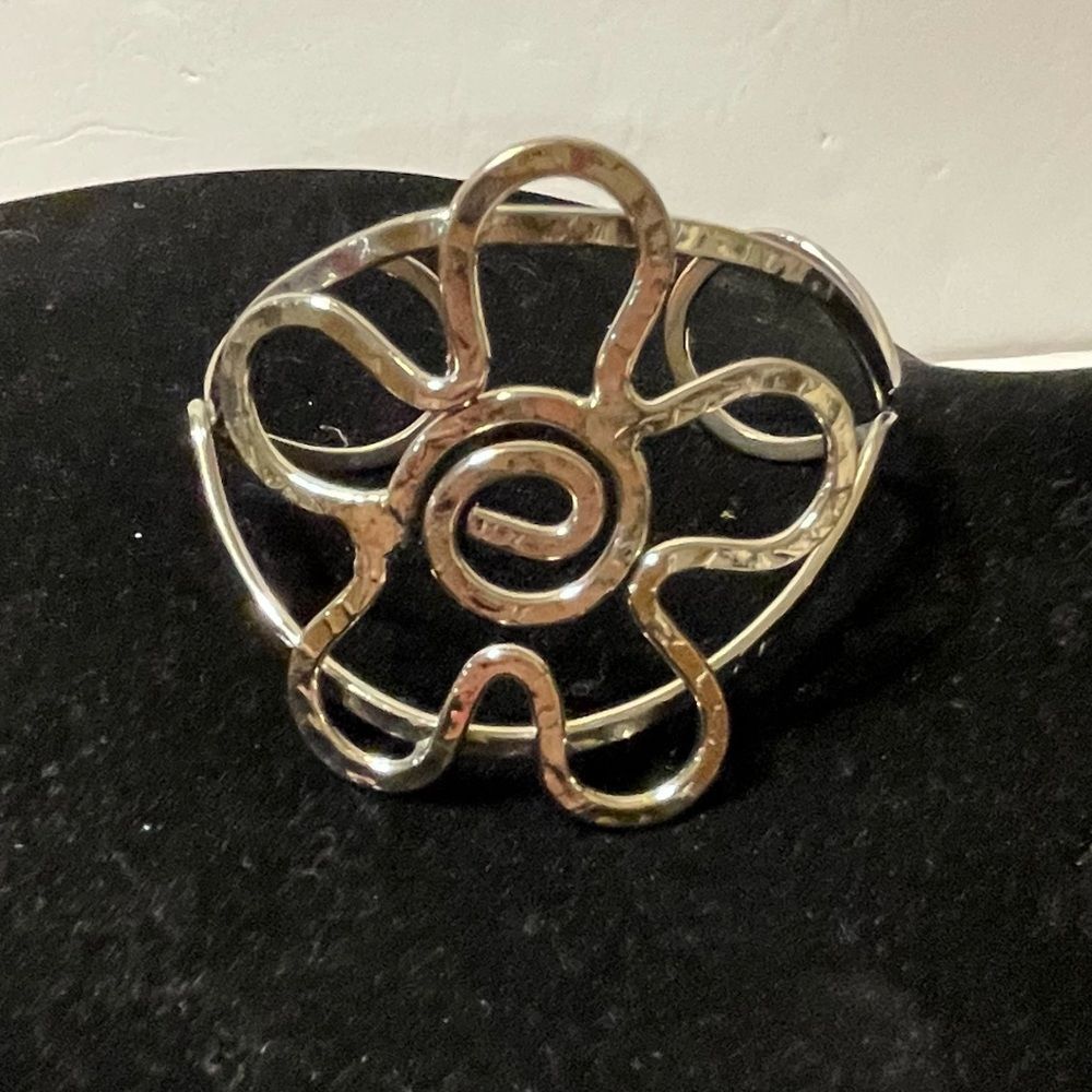 hammered silver tone flower cuff bracelet Shiny